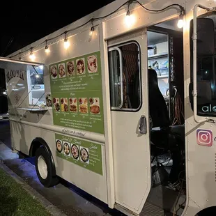 a food truck parked on the side of the road