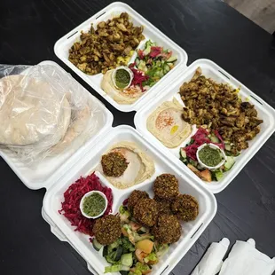 Two chicken plates, one falafel plate