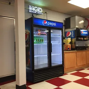 a refrigerated refrigerator in a restaurant