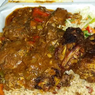 Jerk chicken, stew chicken, rice and peas &amp; cabbage. So delicious!!!!!