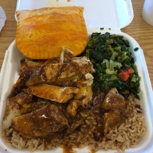 Jerk chicken with collard greens, beans and rice and a spicy beef patty.  A very satisfying (and filling) lunch!