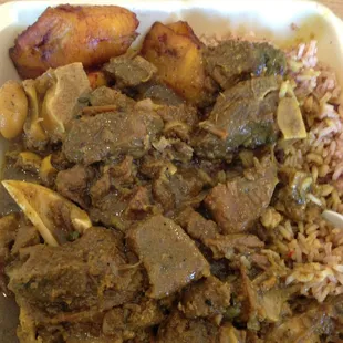 Curry goat (large) with sides of rice &amp; peas and plantains