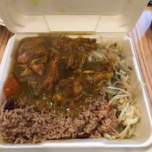 curry chicken, rice and peas, and cabbage