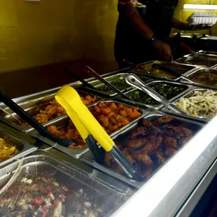 a buffet with a variety of food items
