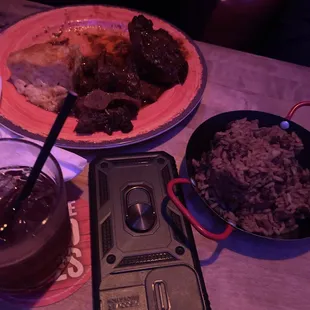 a plate of food and drink on a table