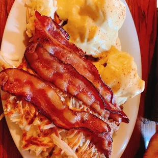 Egg Benedict with a side of bacon