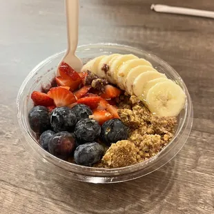 Ocean Breeze Açaí Bowl.   Blueberries, strawberries, banana, honey, granola and Açaí.