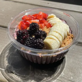 a bowl of fruit and granola
