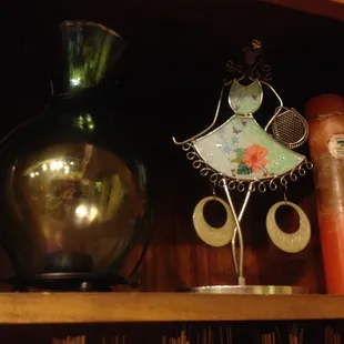 Earrings on top shelf.