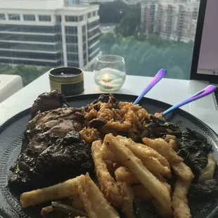 Jerk chicken, fries, and collard greens