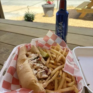 The daily special Scallop Po&apos; Boy with fries.