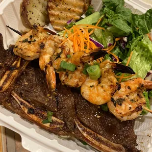 Kalbi Seafood Mix with potatoes and salad