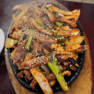 a plate of food being cooked