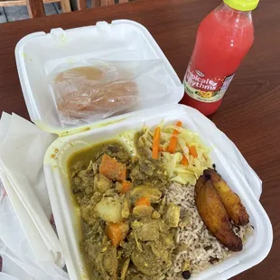 Curry chicken, cabbage, plantains, rice &amp; peas, and coco bread