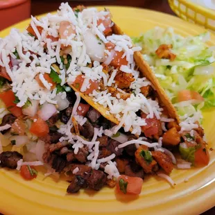 Two crispy tacos a la carte (left is beef, right is chicken)