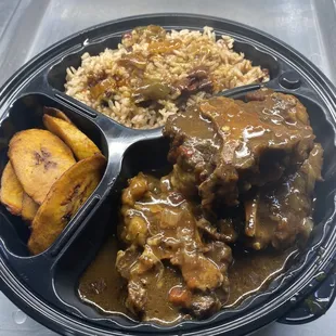 Oxtails comes with two sides