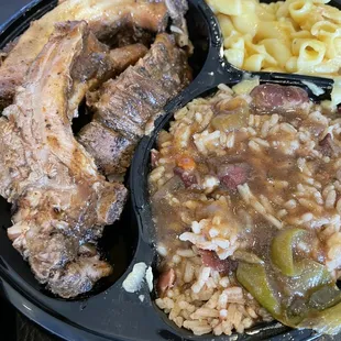 Jerk ribs, rice and peas and macaroni