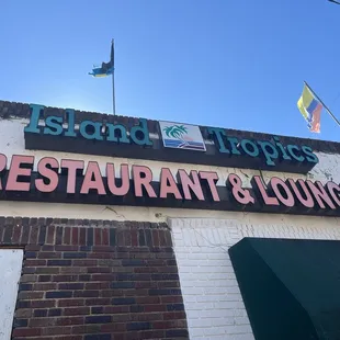 Signs at Main and 16th St E