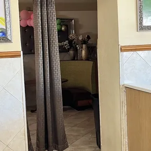 Larger dining area, more seating behind this door