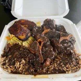 a meal in a styrofoam container