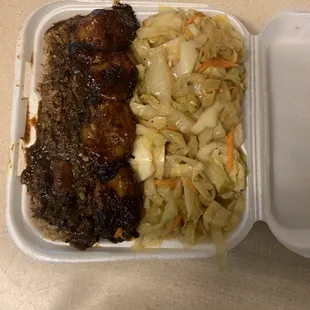 Vegetable plate with oxtail gravy on the rice n peas