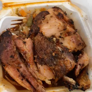 a meal in a styrofoam container