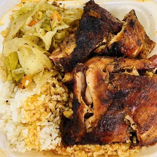 Medium jerk chicken, steamed cabbage, white rice