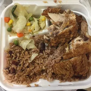 Fried chicken with rice &amp; peas and steamed cabbage.