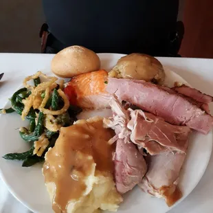 a plate of meat and vegetables