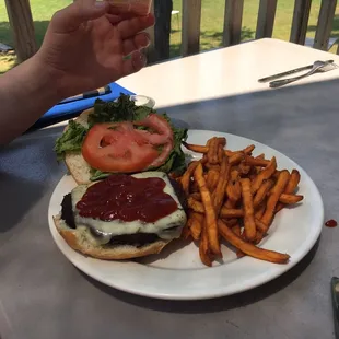 Veggie burger with sweet potato fries