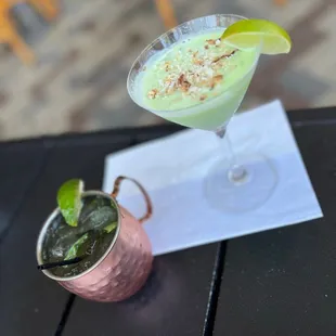 two cocktails on a table