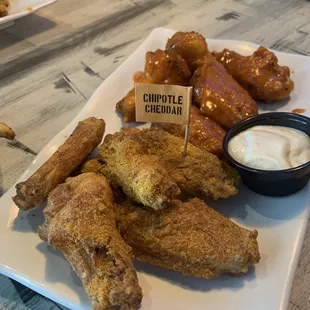 Five Chipotle Cheddar and five Carolina Heat wings.