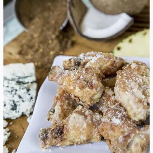 What the garlic Parmesan wings appearance is advertised as.