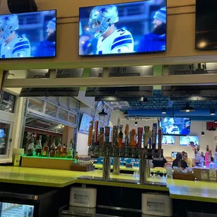 Outside bar area with tv&apos;s