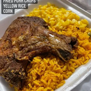 fried pork chops and yellow rice