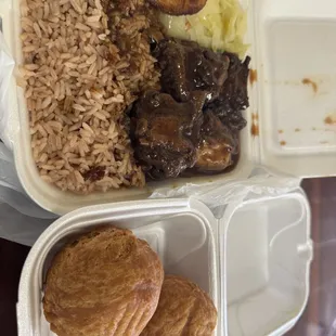 Brown stew chicken lunch and two fried dumplings 9$ for everything