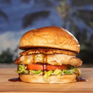 a chicken sandwich with lettuce and tomato