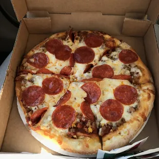 Small &quot;Leaning Tower&quot; To-Go, REALLY enjoyed it!  There is more meat, diced onion and peppers below the cheese/pepperoni layer.