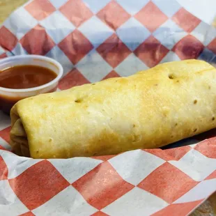 Sarape dog! Two hotdogs with cheese and red chile inside!