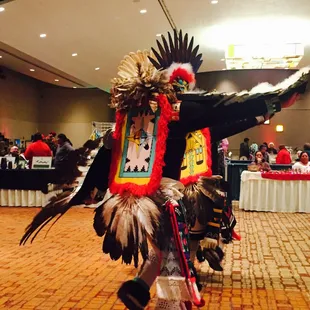 Pueblo market with gifts and dancing