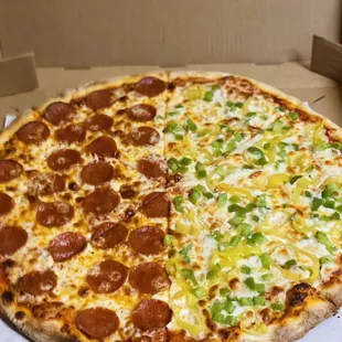 a pepperoni pizza in a box