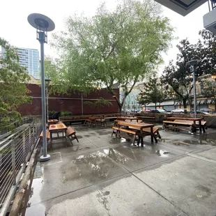 tables and benches on a rainy day