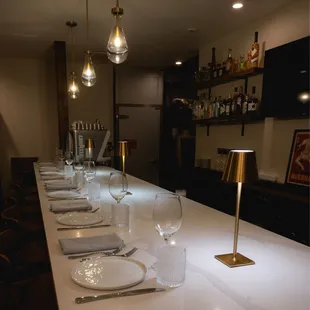 a long table with place settings