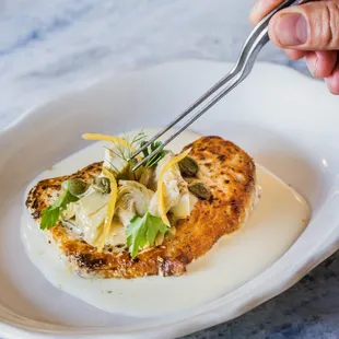 a plate of food with a fork