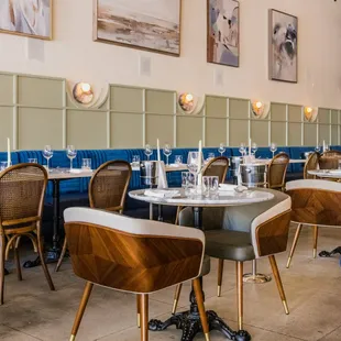 a dining room with tables and chairs