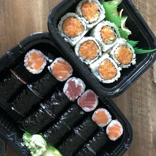 Spicy salmon roll (top), salmon rolls and tuna roll