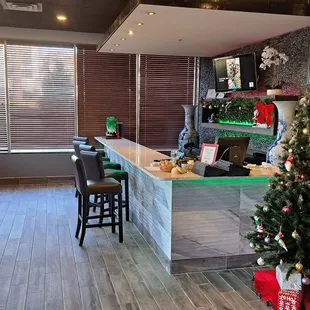  christmas tree in front of the counter