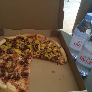 Carry out pizza with falafel and yellow peppers!