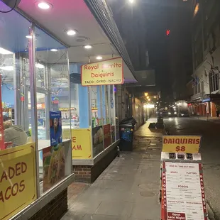 the outside of a restaurant at night