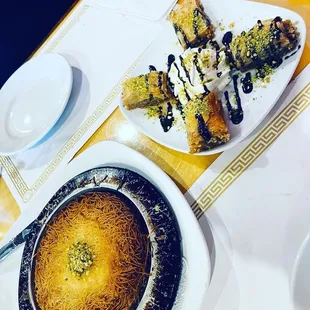 These are deserts. Kunefe is on the left and delicious baklava on the right.